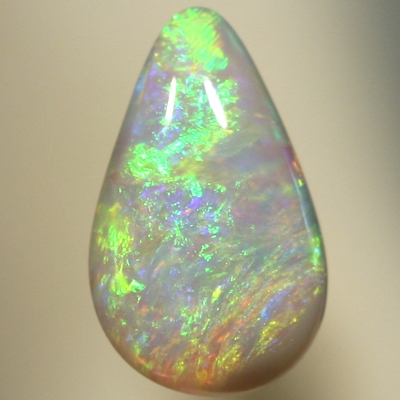 SOLID SEMI BLACK OPAL Orange and green swirls of fire, always showing colour